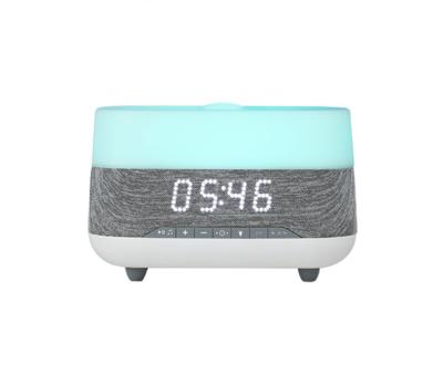 China Aromatherapy Machine 2022 Comfortable Air Clock Sensation Humidifier Home Music Aromatherapy Machine Home Quiet Audio for sale