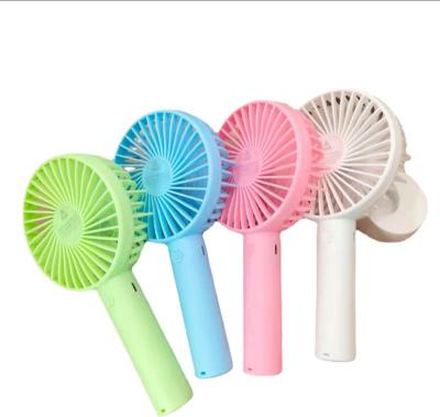 China Fan With Battery High Quality Mini Electric Hand Phone Holder 2022 Designs Small USB Electric Handheld Plastic Portable Fan for sale