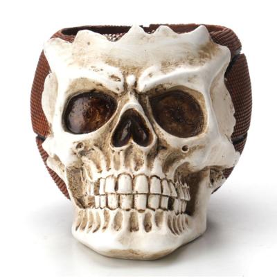 China Promotion Trader New Design Resin Halloween Brown Skull Head Sculpture Pen For Decorating In Storage Basketball for sale