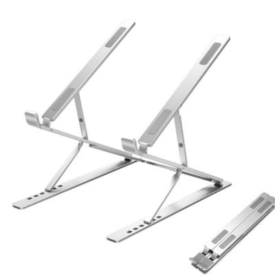 China Within 17 inch 2021 New Arrival Creative Portable Adjustable Foldable Double Layer Raised Aluminum Laptop Stand for sale