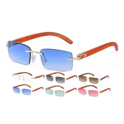 China Vintage Sun Glasses Rectangular Shades Fashion Small Men Women Rectangle Wood Legs Rimless Luxury High End Sun Glasses UV400 Shades for sale