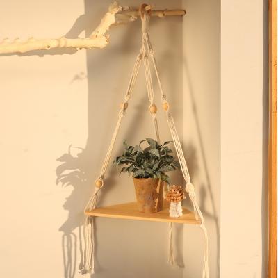 China Large Macrame Plant Flower Pot Hanger Indoor Garden Cotton Boho Floating Shelf Modern Rack Tropical Handmade Wood Storage for sale