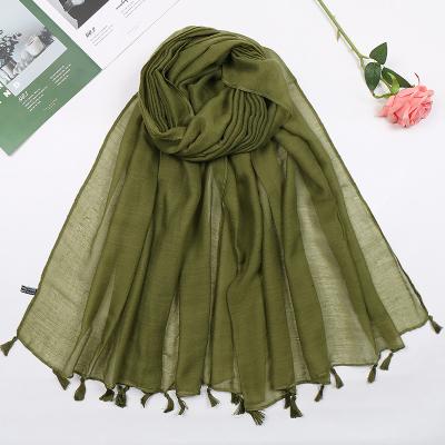 China Yiwu Manufacturers Daily Life Scarf Yiwu Manufacturers Wholesale Hot Selling Universal Solid Color Tassel Air Conditioning Cotton Hemp Sunscreen Shawl for sale