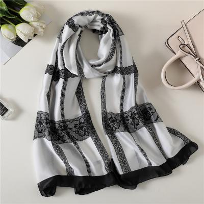 China Long 2022 hot selling large shawls new simulation long scarf lady fashion elegant lace silk plaid shawls for sale