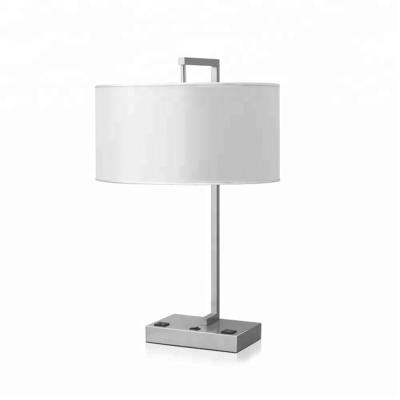 China Modern Brushed Nickel Finish Metal Table Lamp With Electrical Port For Hotel Guest Room for sale