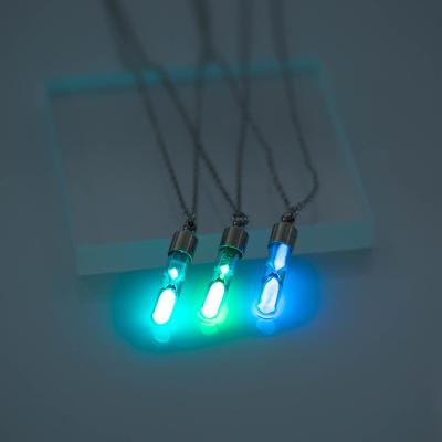 China 2021 Fashion Halloween Gift Luminous Cavity Luminous Pendant Necklace Men and Women Hourglass Luminous Pendant Necklace for sale