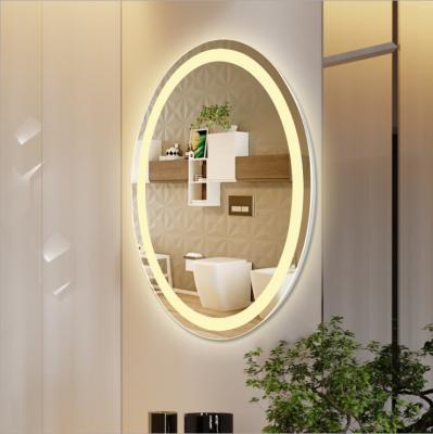 China Modern Oval Square Hotel Office Toilet Bathroom 24 Watt Ladies Toilet Mirror Smart Fog Light Makeup Led Wall Lamps for sale