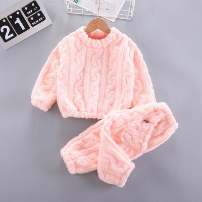 China QUICK DRY children's winter coral pile thickened pajamas set flannel loose main jacquard home warm clothing wholesale for sale