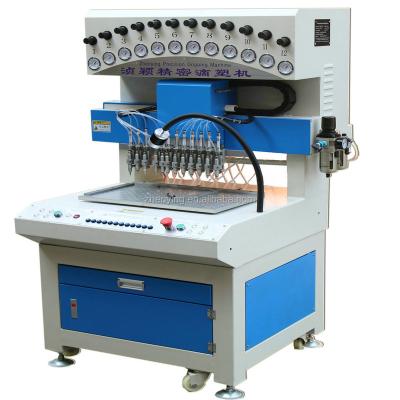 China Garment Shops Hot Sale PVC Rubber Patch Logo Making Machine For Color Filling 12 Colors Automatically for sale