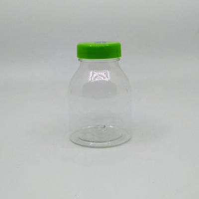 China CANDY Hot Selling Empty Transparent Clear U Shape 250ml PET Candy Gifts Packaging Plastic Bottles For Chewing Gums With Flip Caps for sale