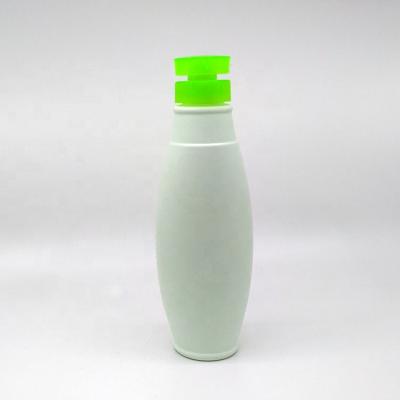 China Hot Sale 780ml Irregular Shape Elegant Empty Shampoo Use HDPE Plastic Bottles Shampoo Bottles With Pump Sprayer For Cosmetic Use for sale