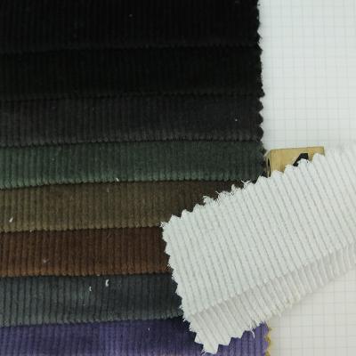 China Wholesale Blackout Style 11 Wale Bulb Woven Elasticity 97% Cotton 3% Spandex Blend Plain Fabric For Pants, Dresses, Coats for sale