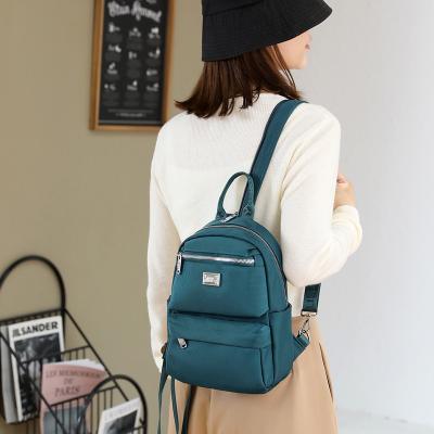 China Fashion Women Waterproof Casual Backpack Ladies Waterproof Nylon Leisure Multifunctional Stylish Backpack for sale