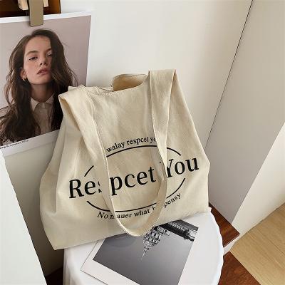 China Luxury Fashion Designer Customized Logo Women's Tote Bag Fashion Canvas Portable Shopping Bag for sale