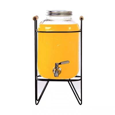 China Sustainable Glass Beverage Dispenser Drink Jar With Stainless Steel Tap And Clip Top Lid for sale