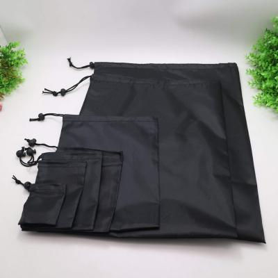 China Small Waterproof Black Nylon Drawstring Bags Sports String Bag For Kids for sale