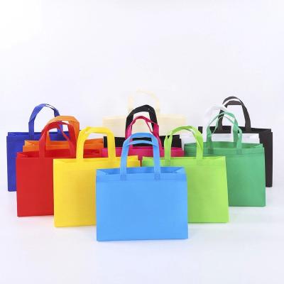 China 100% MOQ 100 PCS Eco-Friendly Cheap Promotional Eco-Friendly Shopping Nonwoven Bags With Rainbow Colors for sale