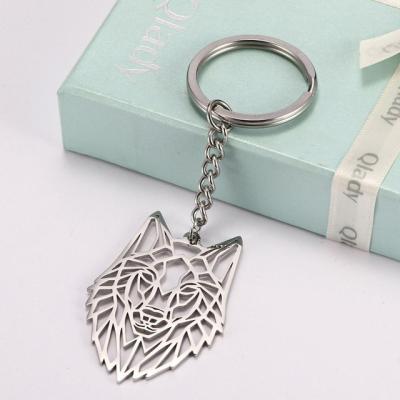 China Cavity Ring Wolf Stainless Steel Jewelry Keyring Keyring Forest Animal Keychain Enamel Metal Key Chain for sale