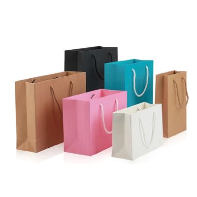 China Custom LOGO Designer Recyclable Printed Clothing Paper Plastic Shopping Bags for sale