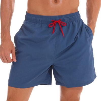 China Viable Custom Logo Solid Color Mens Swim Trunks Mens Swimming Shorts Beach Shorts for sale