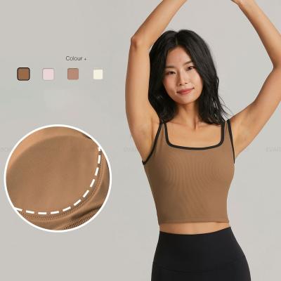 China New Women Breathable White Gym Design Semi Fixed Sports Top Female Fitness Jogging Crop Cup Sports Bra With Chest Pad for sale