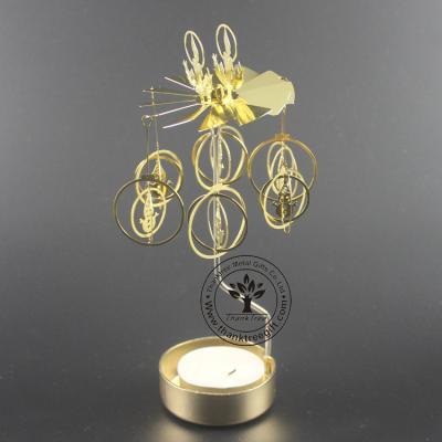 China Fashionable Gold Plated Metal Etching Spinning Revolving Tea Light Candle Holder MCH-036 for sale