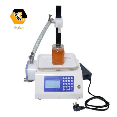 China Semi-automatic Food Filling Machine Honey Bee Products Hand Sanitizer Viscous Filler Liquid Weighing Liquid Filling Machine for sale