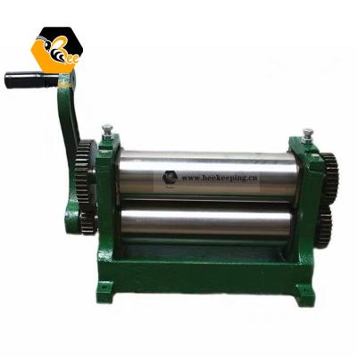 China Manual bee farm beekeeping equipment rolling mill/plate rolling beading machine flat sheet/comb making machine for beeswax sheet for sale