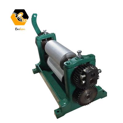 China Manual bee farm beekeeping equipment beeswax comb base sheet roller machine/beeswax stamping machine/beeswax punching machine for sale