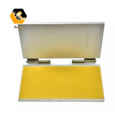 China Bee Farm Laptop Style Manual Beeswax Base Sheet Beeswax Casting Mold Embossing Machine for sale