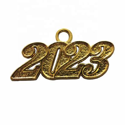 China 2023 year old charming graduate dress gold or silver color for graduation tassels for sale