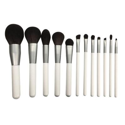 China Angular Blush 12 Piece Powder Soft Fluffy Angle Blush Natural Goat Hair Makeup Set Brush With Makeup Bag for sale