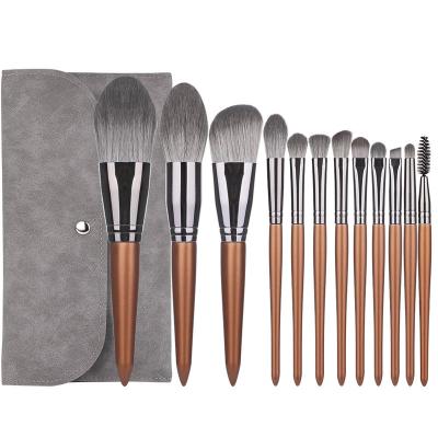 China Angular Blush Makeup Brush Set with Cosmetic Bag Professional Synthetic Lumber 12PCs Brush Set with Own Name for sale