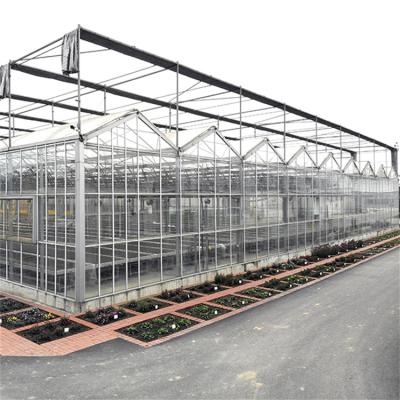 China 100/150/Stable Easily Structure Sustainable Assembled200 Micron PE Film Glass Industrial Insulated Agricultural Glass Greenhouses From China for sale