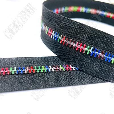 China Fashion Custom High Quality Color Teeth Viable Metal Zipper Long Chain Roll For Decorative Clothes for sale