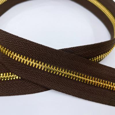 China Sustainable Customized Long Chain Metal Zipper 5# Metal Zipper Roll Teeth Zipper for sale