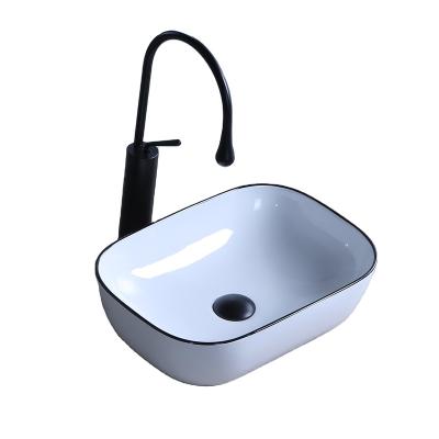 China Easy Clean Classic Design Ceramic Countertop Wash Basin Art Basin With Black Line Decorated Bathroom Sinks for sale