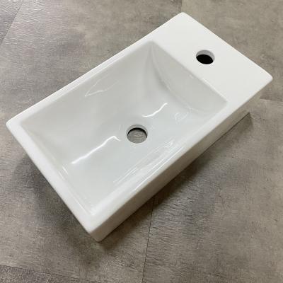 China Easy Clean Modern Porcelain Hand Wash Basin Countertop Art Ceramic Basin for sale