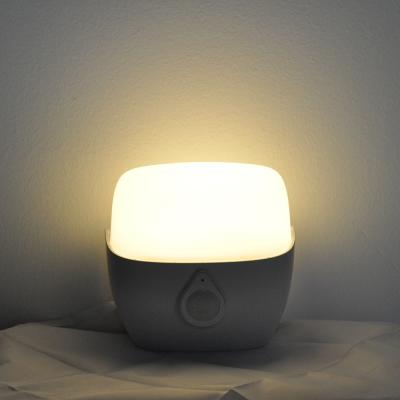 China Tuya Smart Home IP64 Battery Operated Modern Bedroom Bedside Wall Lamp with Human Body Motion Sensing Night Light for sale