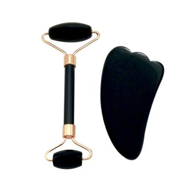 China Drops skin cells; Wholesales Black Obsidian Jade Roller Gua Sha Set Natural Skin Care With Metal Frame Sheep Horn for sale