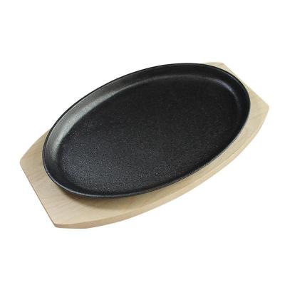 China Sustainable Hot Selling Amazon Cast Iron Sizzle Casserole With Wooden Tray for sale