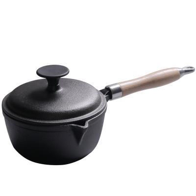 China Sustainable Pre-Seasoned Cast Iron Saucepot With Long Wooden Handle for sale