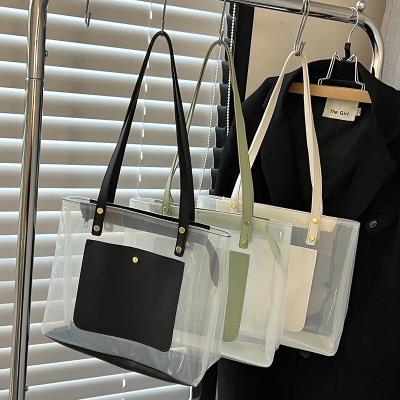 China Luxury Clear Tote Jelly Summer Beach Bags PVC Handbags For Women Purses And Handbags New Fashion Waterproof Designer for sale