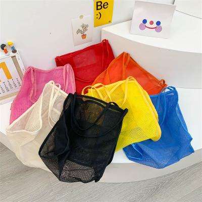 China Large Capacity Handbag Candy Color Shoulder Bag Wholesale Fashion Designer Fashion Designer Outdoor Tote Beach Mesh Bag For Women Shoulder Messenger Bag for sale