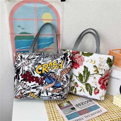 China Wholesale Fashion Designer Graffiti Print Women Handbags Large Capacity Canvas Handle Shoulder Shopping Bag Women Hand Tote Bags for sale