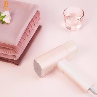 China Portable Electronic Shirt Rolling Hot Air Iron Laundry Press Machine Baseball Ironing Machine for sale