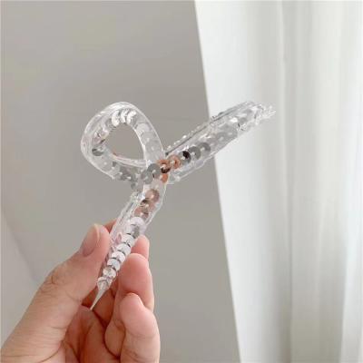 China Transparent Sequin Eco-friendly Korean Version Of Simple Hair Claw Rotating Hair Accessories Hair Claws for sale