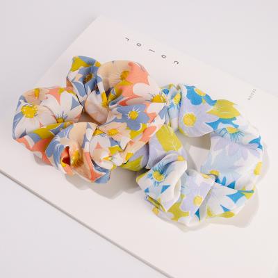 China Hot Attractive Hair Ring Women Fashion Flower Hairbands Large Intestine Spring And Summer Sale for sale