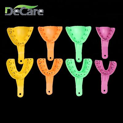 China Colorful Plastic Disposable Plastic Net Dental Impression Adjustable Tray For Teeth Model for sale