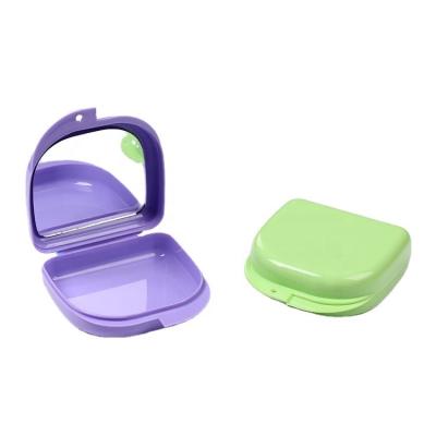 China Dental Regional Whole Plastic Orthodontic Retainer Case Dental Storage Denture Box With Mirror With Slot for sale